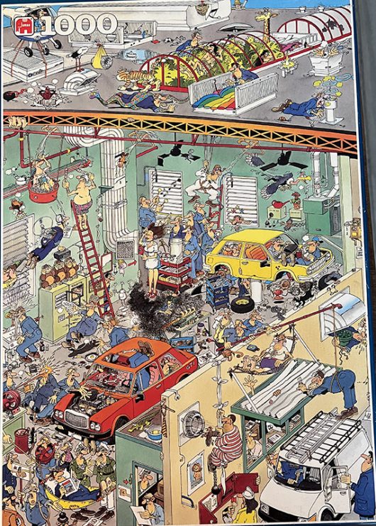 Puzzel van Jan van Haasteren uit 1992 van 1000 stukjes met als thema moderne techniek van het merk Jumbo